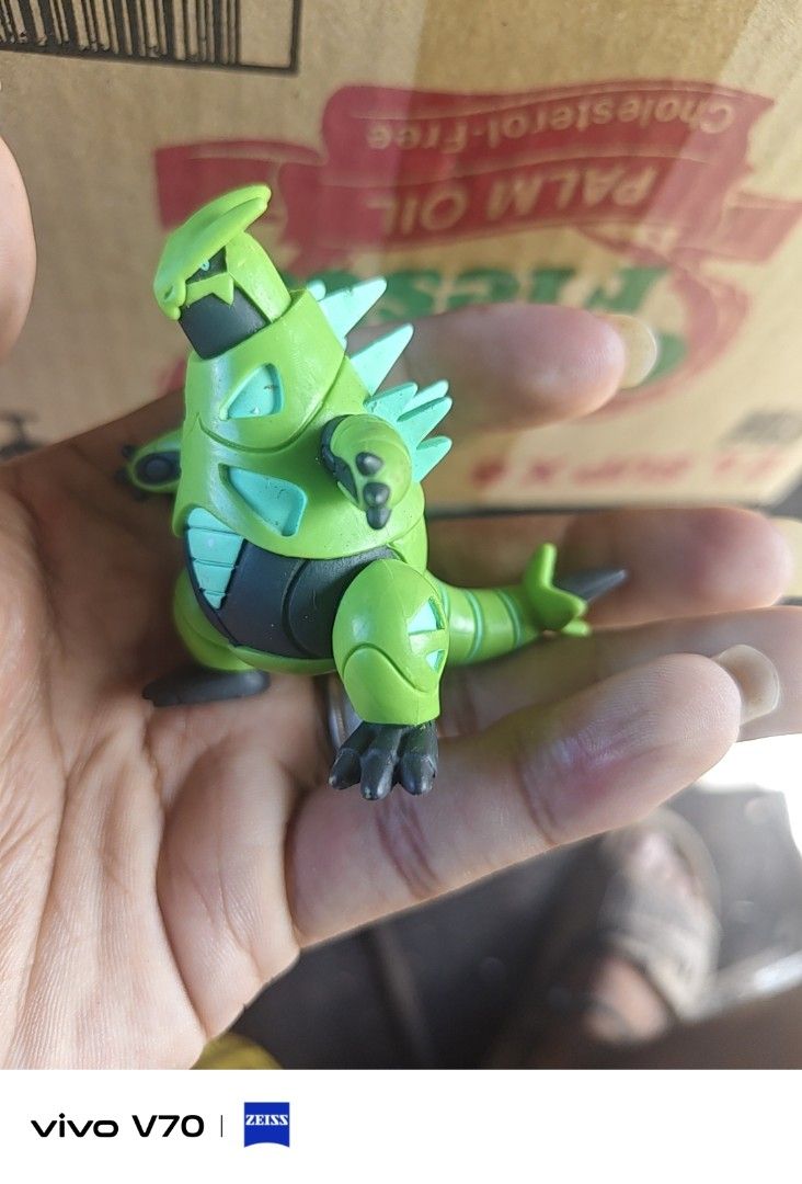 Tyranitar Green Pokemon Toy Figure (Category: Figurines & Statues) located in Kapangan. Submitted by ClumZyDale (Listing ID 1468084233, Image 2). Description: - Green Tyranitar Pokémon mini figure - Detailed spikes along the back and tail tip - Stands upright on its own - Great addition for collectors and fans.