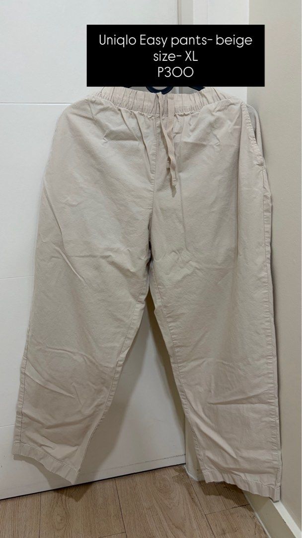 Uniqlo Easy Pants Beige Size XL (Category: Trousers) located in Pasig City. Submitted by sheencf (Listing ID 1468189408, Image 1). Description: - Brand: Uniqlo Easy Pants - Color: Beige - Size: XL - Material: 100% cotton (super comfortable for daily wear) - Fit: Straight fit with elastic waistband and adjustable drawstring - Size Guide (Inner Tag): Fits waist 75-81 cm, Hips 100-106 cm - Origin: Made in Vietnam ♻️ RFS: Decluttering 💸 MOP: GCash o