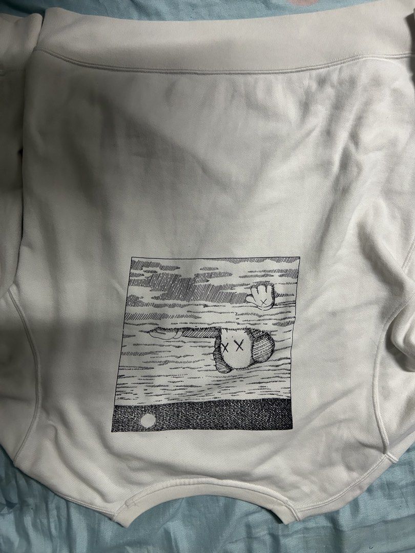 Uniqlo KAWS longsleeve Sweatshirt (Category: Coats, Jackets and Outerwear) located in Baguio. Submitted by alexistamira (Listing ID 1468195426, Image 3). Description: Na tangal yung tag niya seen in pic and measurements ng length and width and size medium po .