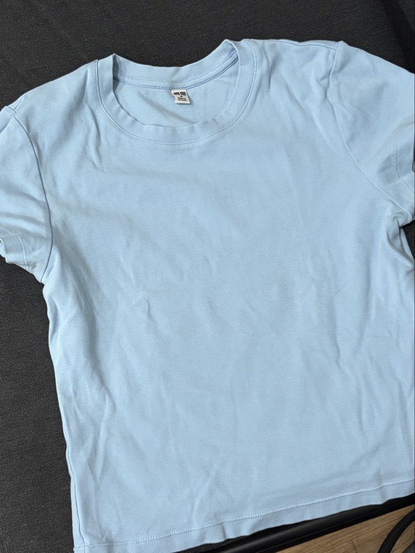 Uniqlo Light Blue Top (Category: Shirts) located in Manila. Submitted by cpaa.aaa (Listing ID 1468131727, Image 2). Description: Uniqlo Light Blue Size: S-M Fitted silhouette with short sleeves and crew neckline.