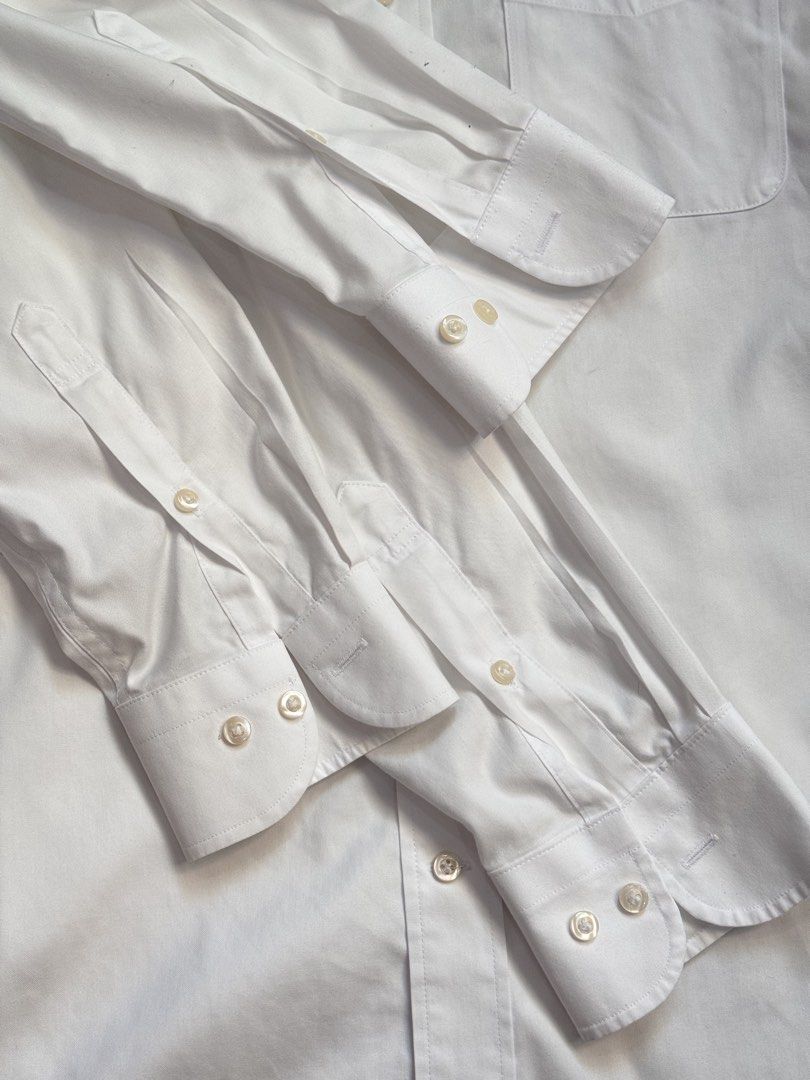 Uniqlo Non Iron small (Category: Formal Shirts) located in Manila. Submitted by ibanezph (Listing ID 1468109751, Image 3). Description: Uniqlo Non Iron longsleeves Size SMALL 9/10 condition No issues 1 pc black 8/10 color rate 3pcs white Selling as package only 3,000 for 4pcs 800each Angono rizal area Lalamove or pickup only.