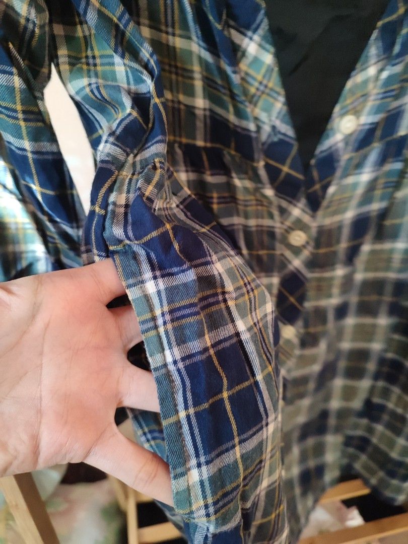 Uniqlo Plaid Dress (Category: Babies & Kids Fashion) located in Jaen. Submitted by roxantiago (Listing ID 1468249236, Image 3). Description: - Brand: Uniqlo - Style: Plaid flannel dress in blue, green, and white - Features: Long sleeves, button-front closure, side pockets, and inner black chest lining - Size: 140 (Kids) - Origin: Made in India - Condition: Great casual everyday piece can remove the black cloth upon request .