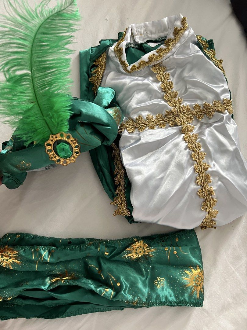 United Nations Costume (Category: Babies & Kids Fashion) located in Manila. Submitted by michdc07 (Listing ID 1468090502, Image 2). Description: -Arabian Prince costume for United Nations, Book Week, school plays, or costume parties, Halloween - Includes satin tunic top with gold trim, matching patterned trousers, and a feather headband with a faux emerald gem - Features vibrant colors and shiny fabric -sword not included -size 110 on tag (4-5yrs