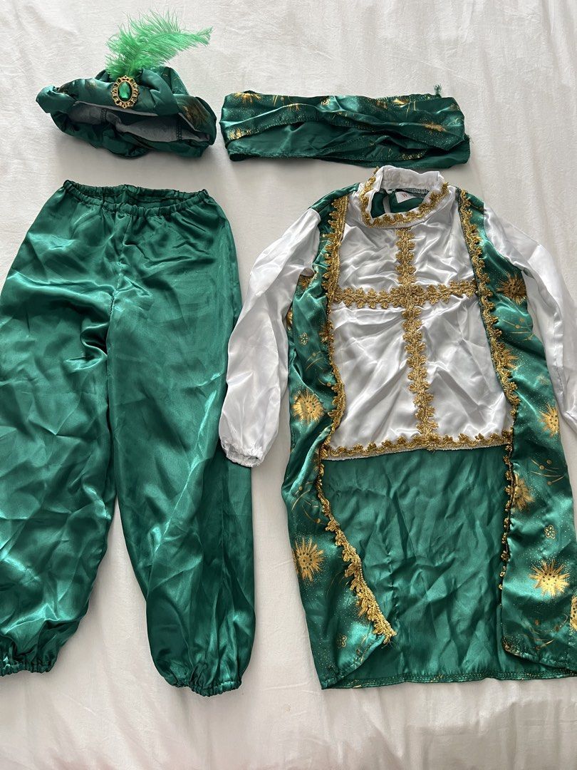 United Nations Costume (Category: Babies & Kids Fashion) located in Manila. Submitted by michdc07 (Listing ID 1468090502, Image 3). Description: -Arabian Prince costume for United Nations, Book Week, school plays, or costume parties, Halloween - Includes satin tunic top with gold trim, matching patterned trousers, and a feather headband with a faux emerald gem - Features vibrant colors and shiny fabric -sword not included -size 110 on tag (4-5yrs