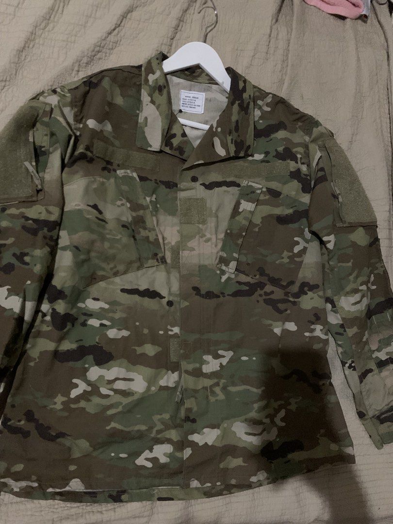US Army OCP Multicam Combat Jacket Medium Regular (Category: Coats, Jackets and Outerwear) located in Manila. Submitted by spaceshop12345 (Listing ID 1468178983, Image 2). Description: - Authentic US Army OCP Multicam combat coat - Size: Medium Regular (fits chest 37-41", height 67-71") - NSN: 8415-01-623-5528 - Features Velcro panels on chest and sleeves for patches - Secure button front closure with protective fabric flap - Premium tactical gea