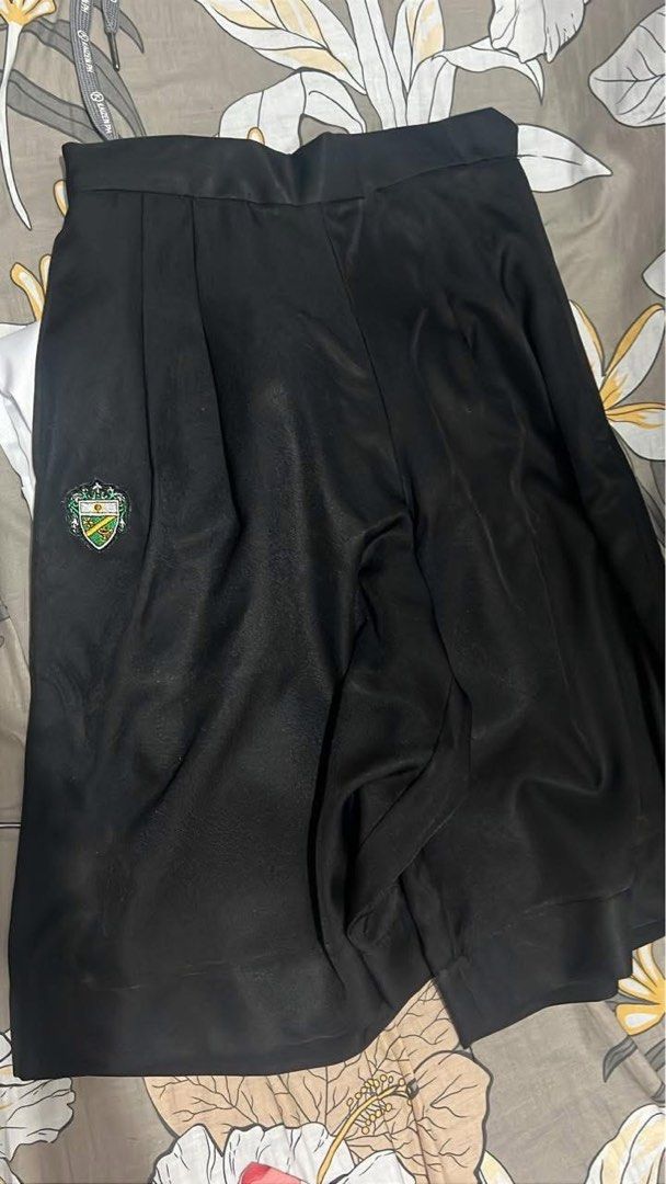UST College of Nursing Cullotes Type B uniform (Category: Shorts) located in Manila. Submitted by monicadevera (Listing ID 1468091889, Image 1). Description: - 1 pc remaining among 5 pcs, slightly used but excellent condition - Design: Pleated with a structured fit and small embroidered school crest - Waistband: Thick and comfortable - Condition: Excellent, clean with no stains or rips.