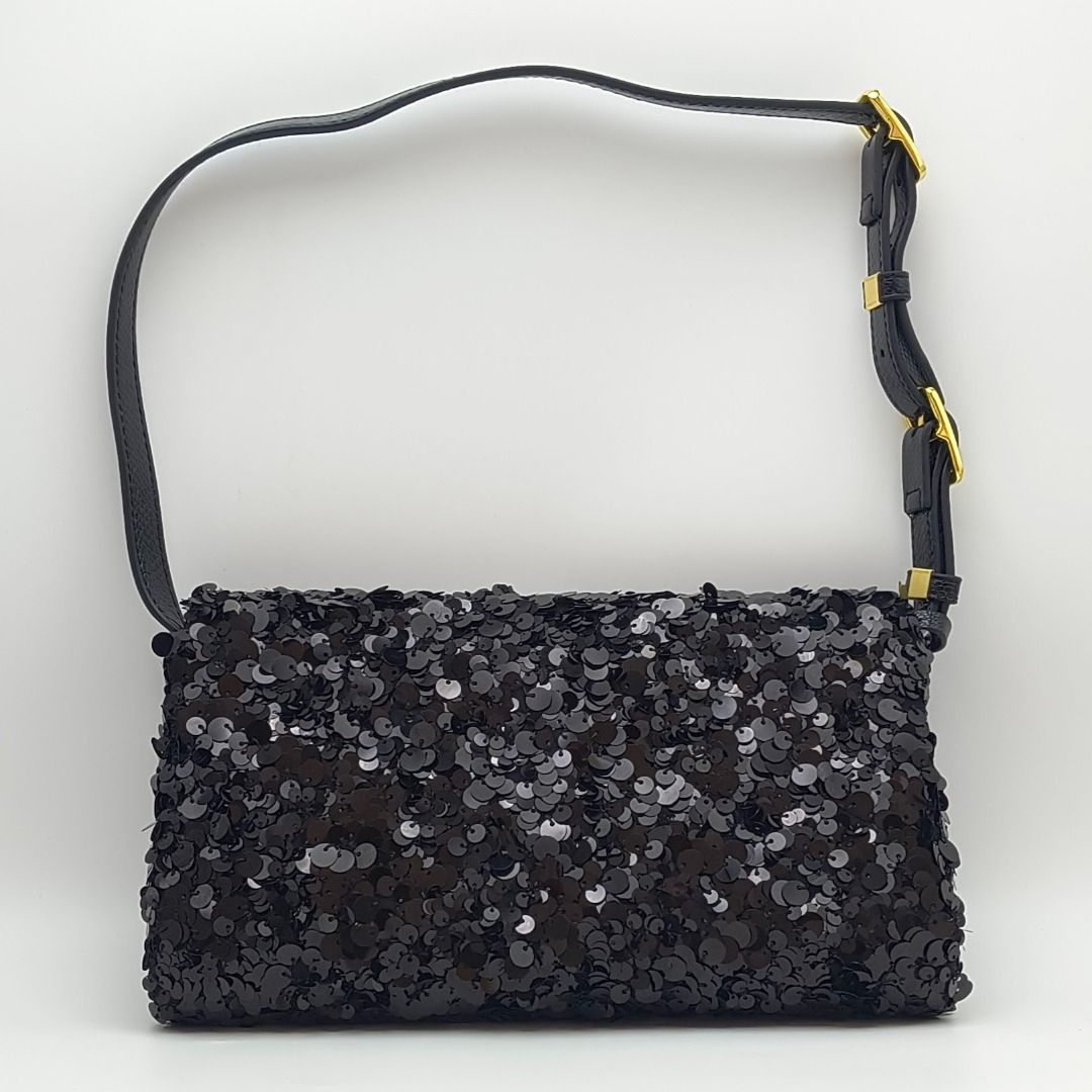 Valentino DeVain Small Bag Rhombelle Sequin Black (Category: Luxury Bags & Wallets) located in Cebu City. Submitted by affordabagss (Listing ID 1468243368, Image 3). Description: Valentino Garavani DeVain Small shoulder bag with black Rhombelle sequin embroidery. Features the signature VLogo, leather trim and an adjustable shoulder strap. Finished with a smooth satin interior. Length: 24 cm Height: 12 cm Depth: 3 cm Colour: Black Material(s): Seq
