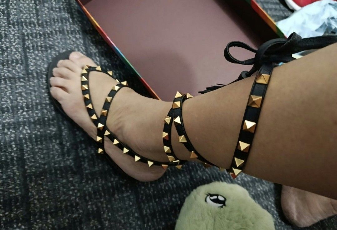 Valentino Garavani Rockstud Wrap Gladiator Sandals Black (Category: Flats & Sandals) located in Paranaque City. Submitted by calm_youngstore7 (Listing ID 1468099219, Image 1). Description: 90% OFF RETAIL! Valentino Gladiator Rockstud Sandals Updated version of Valentino Garavani's gladiator-inspired 'Rockstud' sandals has athong strap and ties that wrap around your ankles. Set on a slight heel, made in Italy from smooth leather and hand-embellish