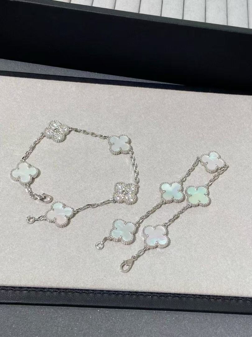 Van Cleef & Arpels Alhambra clover motif bracelet (Category: Bracelets) located in Mandaluyong City. Submitted by sadihaviur09733 (Listing ID 1468124705, Image 1). Description: - Design: Silver-tone chain with four-leaf clover motifs - Details: Alternating mother-of-pearl style white clovers and sparkly pavé crystal clovers - Closure: Secure lobster clasp with adjustment links for a custom fit - Fit: Standard length, delicate and versatile - Cond