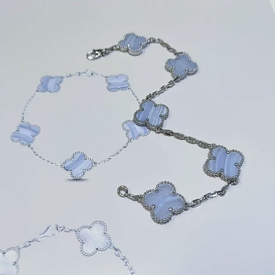 Van Cleef & Arpels Vintage Alhambra Blue Agate Bracelet (Category: Bracelets) located in Quezon City. Submitted by reifancova27621 (Listing ID 1468139974, Image 3). Description: - Silver-tone chain bracelet in classic Alhambra style - Features five clover motifs in banded light blue chalcedony or agate stone - Delicate beaded border around each clover - Secure lobster clasp closure - Clean metalwork and stones in great shape.