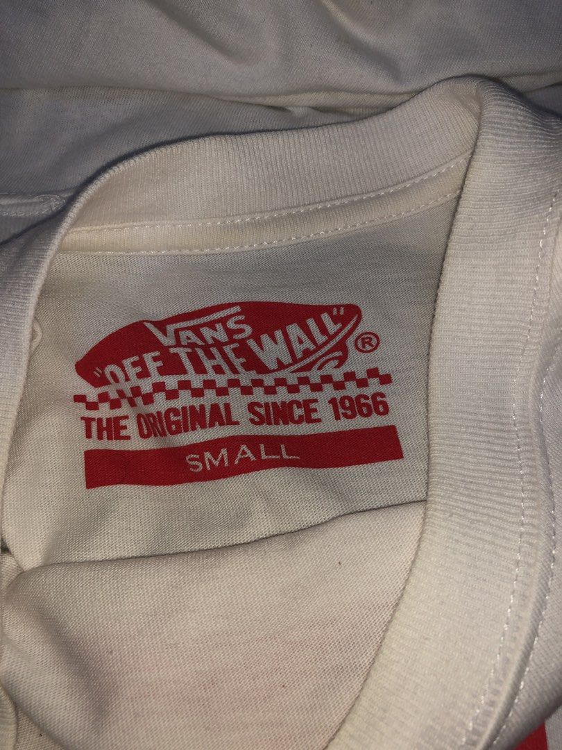 Vans Classic Red Logo White T-Shirt (Category: Tshirts & Polo Shirts ) located in Magsaysay. Submitted by ryns_thrifting (Listing ID 1468164929, Image 2). Description: - Brand: Vans - Style: Crew neck short sleeve tee - Color: White with classic red box logo - Size: Small - Details: Red woven tag on left sleeve hem, 'Off The Wall' interior neck print - Material: Clean, comfortable cotton.