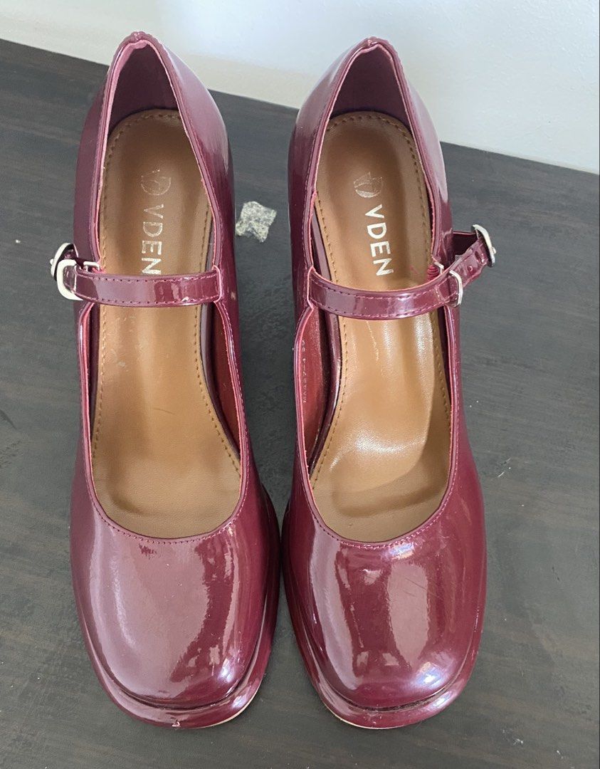 VDEN Maroon Mary Jane Block Heels Platform Shoes (Category: Heels) located in Caloocan City. Submitted by michalskir01472 (Listing ID 1468068923, Image 1). Description: - Brand: VDEN - Color/Finish: Maroon patent - Style: Mary Jane heels with chunky block heels and front platform - Details: Square toe shape, adjustable ankle strap with silver buckle - Fit & Styling: Comfortable height, easy to style with socks or tights - Condition: Soles show mo