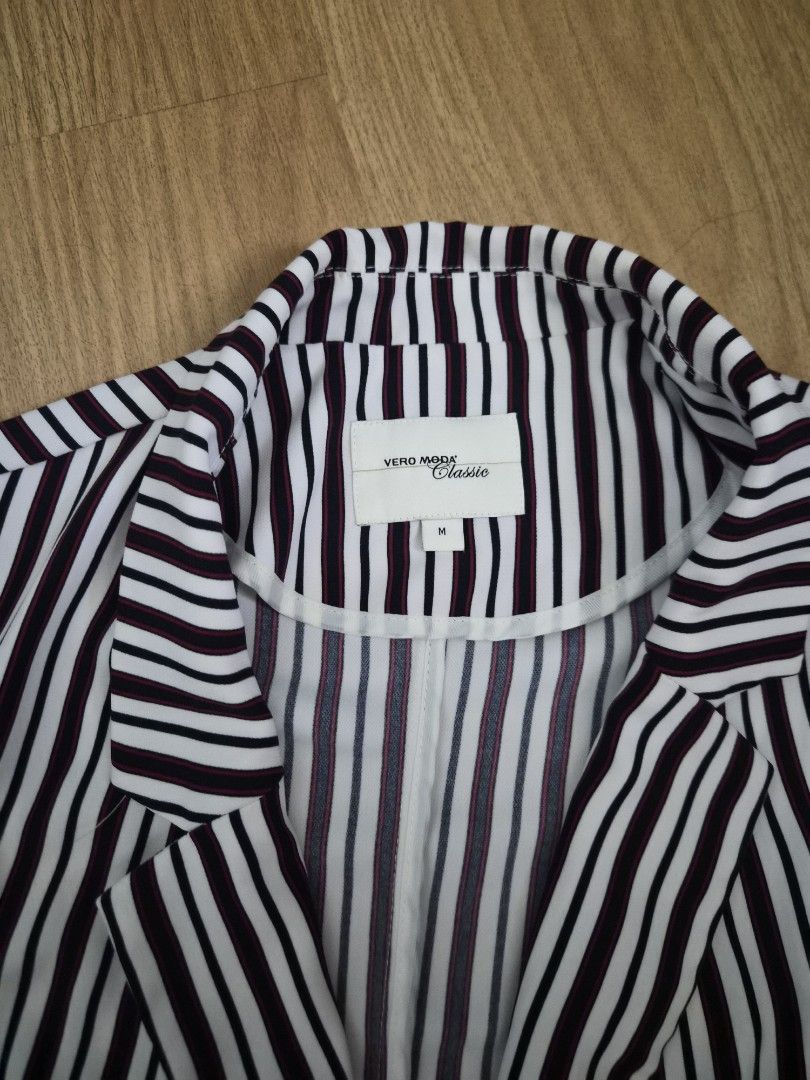 Vero Moda Classic Striped Blazer Size M (Category: Coats, Jackets and Outerwear) located in Cavite. Submitted by frombellas (Listing ID 1468092002, Image 3). Description: - Brand: Vero Moda - Size: M (True to size) - Color: Classic black and white stripes - Features: Two-button front closure, notched lapels, and front pockets - Fabric: Lightweight, ideal for office or smart casual wear - Condition: Clean and ready to wear.