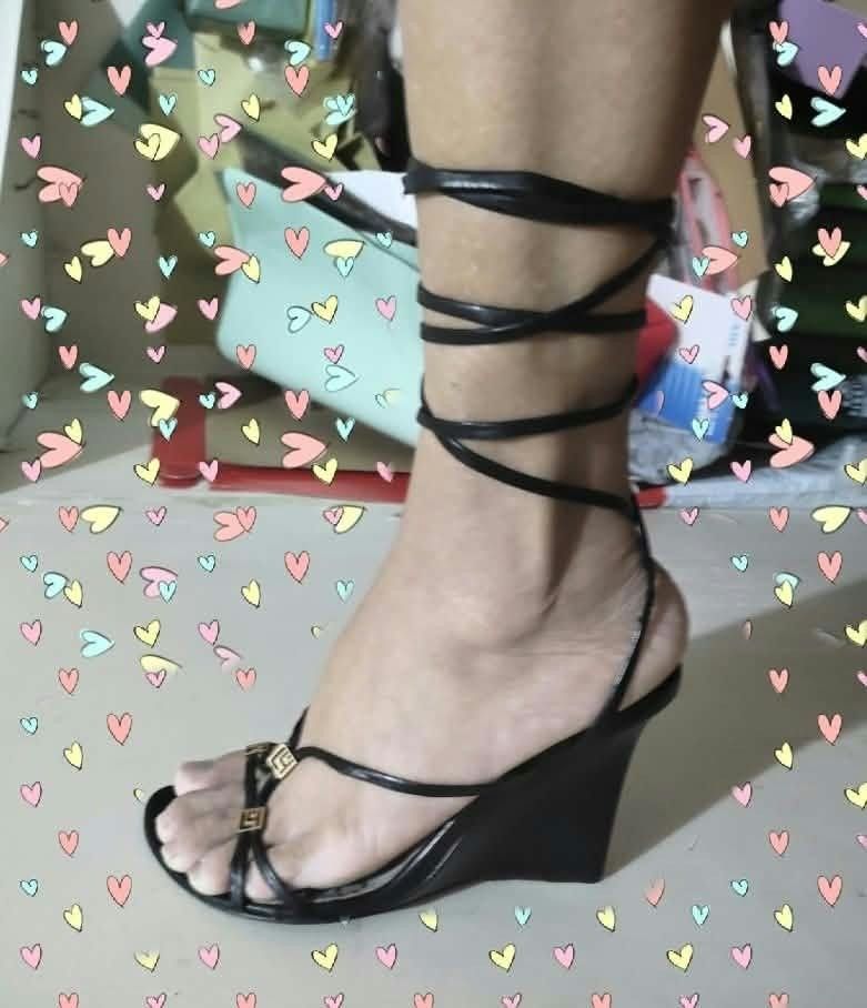 Versace Classics Black Lace-Up Wedge Sandals (Category: Wedges) located in Paranaque City. Submitted by calm_youngstore7 (Listing ID 1468098821, Image 2). Description: - Brand: Versace Classics - Color: Black with gold hardware accents - Style: Strappy wedge sandals with lace-up ankle ties - Condition: Worn a few times, minor wear on soles and inner footbeds - Details: Features Versace branding prints on the insoles - Meet-ups or shipping via J&T