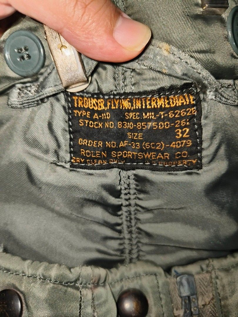 Vintage 1950s USAF Type A-11D Intermediate Flying Trousers (Category: Coats, Jackets and Outerwear) located in Baguio. Submitted by luxeloomarchive (Listing ID 1468261478, Image 3). Description: Vintage 1950s USAF Type A-11D Intermediate Flying Trousers Own an authentic piece of aviation history! These genuine 1950s U.S. Air Force flight pants are a masterclass in rugged, utilitarian design. • The Details: Features the highly collectible original