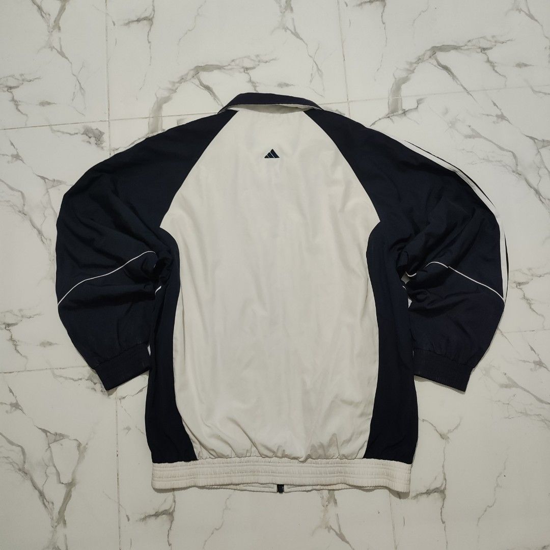 Vintage Adidas Navy White Track Jacket (Category: Coats, Jackets and Outerwear) located in Maria Aurora. Submitted by pewpewww22 (Listing ID 1468169064, Image 2). Description: dimes-24.5 by 28.5 inch 6/10 condition fade neckcollar.