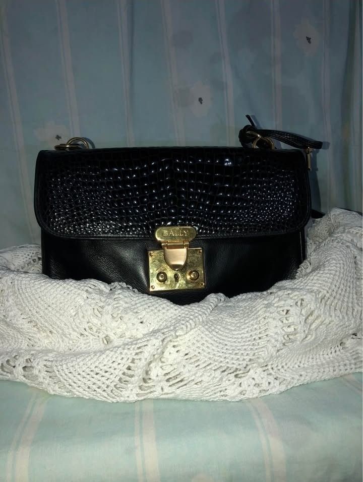 Vintage Bally Lock Me Croc-Embossed Leather Shoulder Bag — Authentic (Category: Shoulder Bags) located in Manila. Submitted by jocelyn527 (Listing ID 1468105261, Image 1). Description: Timeless Elegance — A True Classic Piece ✨ 🖤 Where to use & why you'll love it: ✅ Special Occasions & Events — Perfect for dinners, weddings, parties, and formal gatherings. Sleek black with gold hardware adds instant sophistication! ✅ Office & Professional Wear —