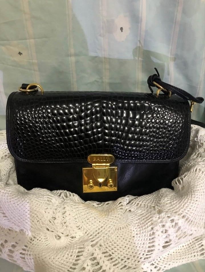Vintage Bally Lock Me Croc-Embossed Leather Shoulder Bag — Authentic (Category: Shoulder Bags) located in Manila. Submitted by jocelyn527 (Listing ID 1468105261, Image 2). Description: Timeless Elegance — A True Classic Piece ✨ 🖤 Where to use & why you'll love it: ✅ Special Occasions & Events — Perfect for dinners, weddings, parties, and formal gatherings. Sleek black with gold hardware adds instant sophistication! ✅ Office & Professional Wear —