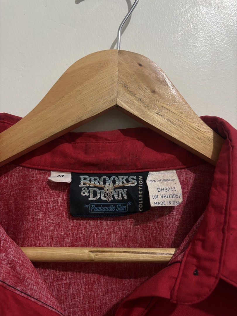 Vintage Brooks & Dunn Flame Graphic Button Down Long Sleeve (Category: Formal Shirts) located in Cabiao. Submitted by thelifeofgelo (Listing ID 1468092303, Image 3). Description: Vintage Brooks & Dunn Flame Graphic Button Down Long Sleeve Size: Medium Width: 21.5 Length: 27 (29 back) Issue: Minimal dot stain Very good condition Price: 1000 + shipping fee .