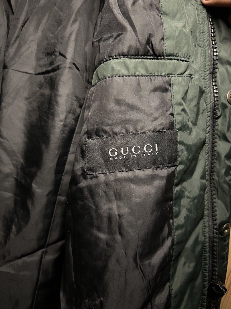 Vintage Gucci 2007 Web Trim Nylon Bomber Jacket (Category: Luxury Apparel) located in Manila. Submitted by zerowasteco. (Listing ID 1466948443, Image 3). Description: -Authentic Gucci Vintage 2007 -Gucci 2007 Web Trim Nylon Bomber Jacket Produced during Gucci’s acclaimed mid-2000s era under Frida Giannini, this bomber jacket interprets classic military flight aesthetics through the lens of Florentine luxury tailoring. Constructed in Italy from re