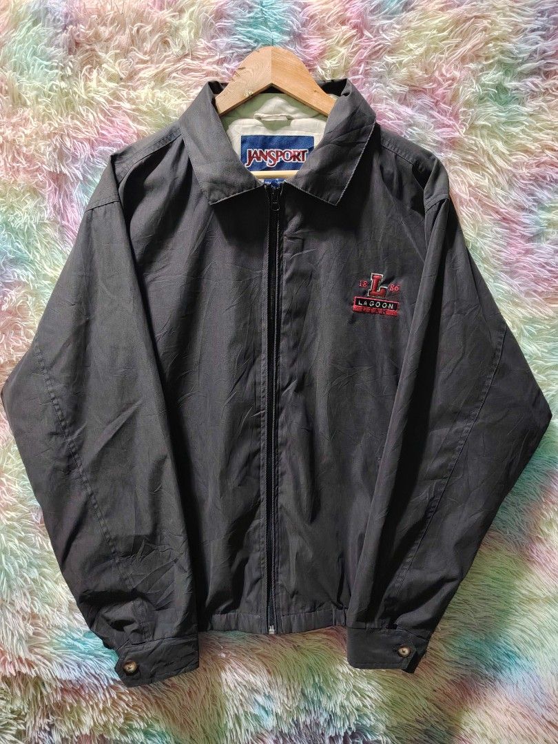 Vintage JanSport Black Microfiber Windbreaker Track Jacket (Category: Coats, Jackets and Outerwear) located in Palo. Submitted by ubnathrifteez (Listing ID 1466082409, Image 2). Description: DIMES ; L26W24 CONDITION ; LIKE NEW COLOR RATE ; 10/10 ISSUE ; NONE.