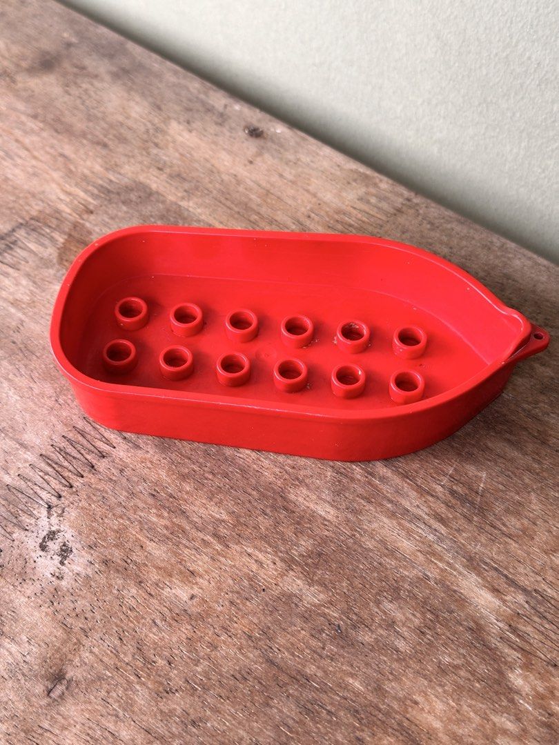 Vintage Lego Duplo Red Boat (Category: Vintage Collectibles) located in Mandaluyong City. Submitted by collectorsobsessions (Listing ID 1468086016, Image 1). Description: - Lego boat in Good condition. - With some dirt so it may need some cleaning. - Plain color, no design. - Comes as is, what you see is what you get. - PRICE: P300.