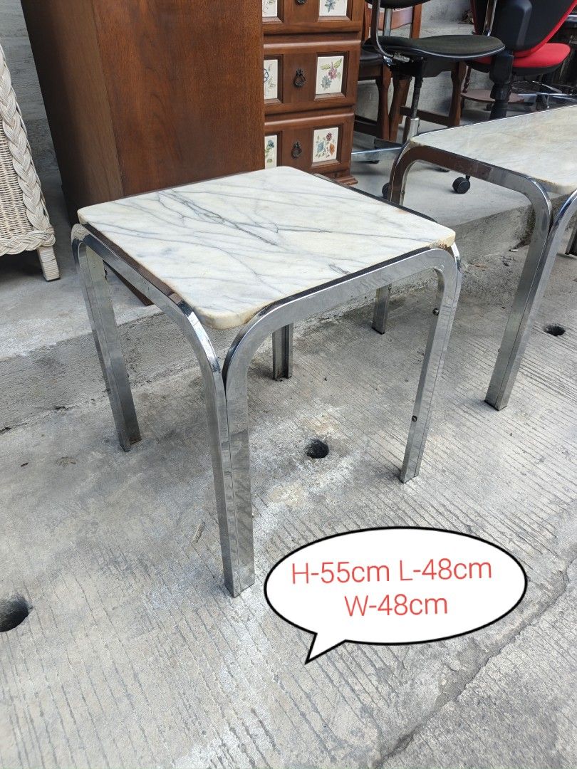 Vintage Marble Top Side Table Chrome Legs (Category: Tables & Sets) located in Valenzuela. Submitted by kendra071914 (Listing ID 1468191800, Image 1). Description: - Marble top with elegant grey veining patterns - Shiny chrome tubular legs and sturdy metal frame underneath - Compact dimensions: 48cm (L) x 48cm (W) x 55cm (H) - Versatile size, ideal as a corner table or bedside stand - Condition: Minor wear on the metal frame from previous use.