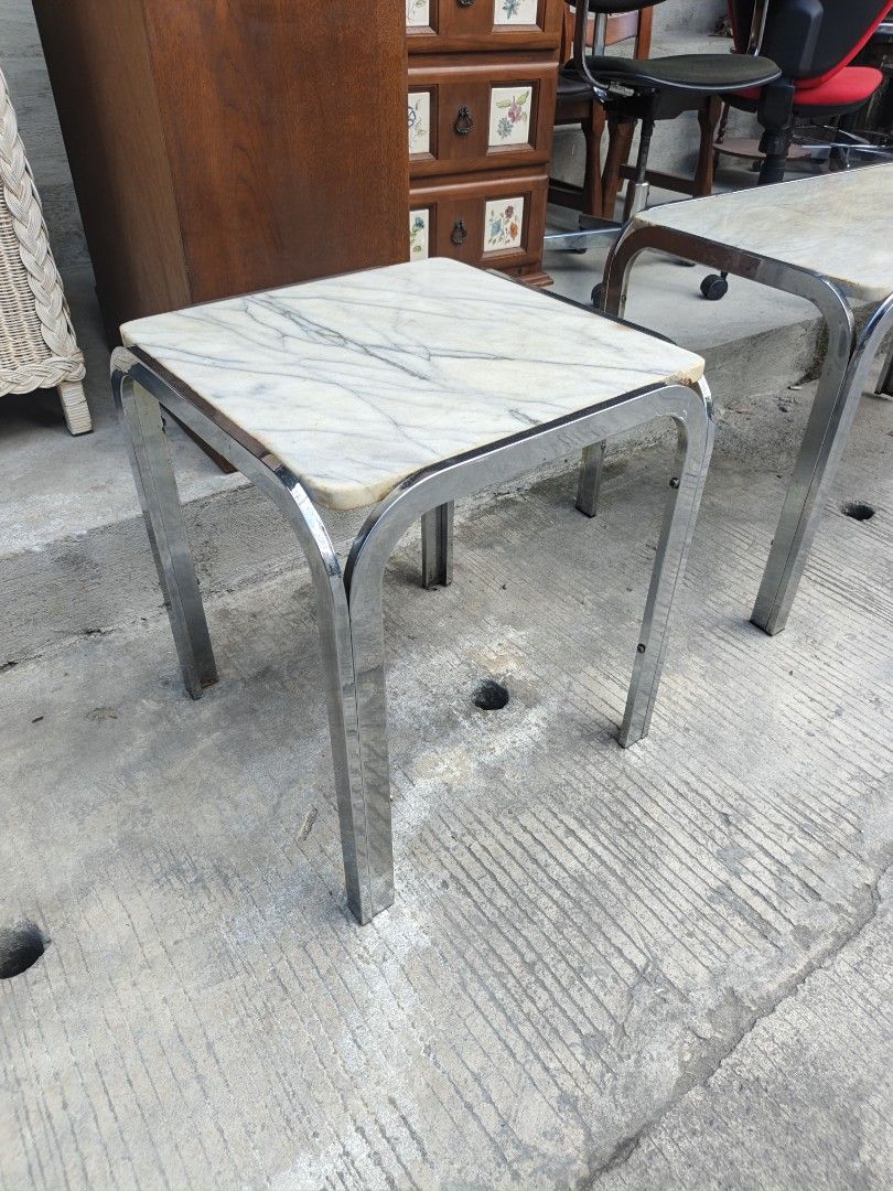 Vintage Marble Top Side Table Chrome Legs (Category: Tables & Sets) located in Valenzuela. Submitted by kendra071914 (Listing ID 1468191800, Image 2). Description: - Marble top with elegant grey veining patterns - Shiny chrome tubular legs and sturdy metal frame underneath - Compact dimensions: 48cm (L) x 48cm (W) x 55cm (H) - Versatile size, ideal as a corner table or bedside stand - Condition: Minor wear on the metal frame from previous use.