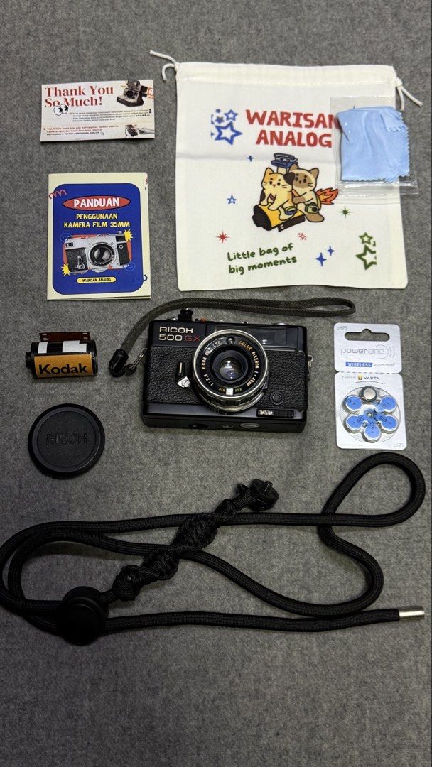VINTAGE RICOH 500 GX (Category: Cameras) located in Rizal. Submitted by eecezy2thrift (Listing ID 1468095228, Image 1). Description: Vintage Ricoh 500GX Working camera bought from Warisan Analog Indonesia Free Kodak 400 film Strap Complete inclusions when bought included and unused 📌 𝗜𝗠𝗣𝗢𝗥𝗧𝗔𝗡𝗧 𝗡𝗢𝗧𝗘 ☟︎. 🚨◎ 𝗗𝗜𝗦𝗖𝗟𝗔𝗜𝗠𝗘𝗥: 𝗜 𝗵𝗲𝗿𝗲𝗯𝘆 𝗱𝗲𝗰𝗹𝗮𝗿𝗲 𝘁𝗵𝗮𝘁 𝗶 𝗱𝗼 𝗻𝗼𝘁 𝗼𝘄𝗻 𝘁𝗵𝗲 𝗿𝗶𝗴𝗵𝘁𝘀 𝗼𝗳 𝗮𝗻𝘆 𝗼𝗳 𝘁𝗵𝗲 