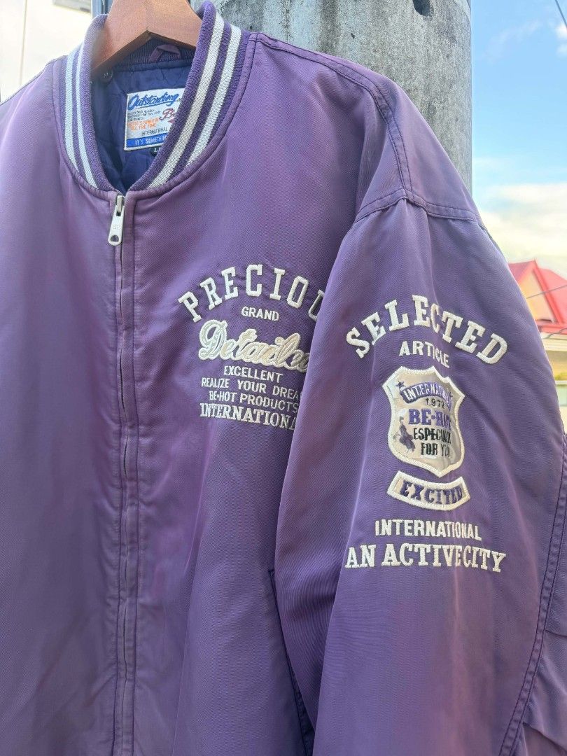Vintage Varsity Jacket (Category: Coats, Jackets and Outerwear) located in Paranaque City. Submitted by prettyboy26 (Listing ID 1468158515, Image 3). Description: ​🏷️ Vintage Be-Hot International Satin Bomber Jacket (Purple) ​Up for grabs is an authentic vintage bomber/varsity-style satin jacket by Be-Hot International featuring bold embroidered graphic patches on the chest, sleeve, and back. ​📌 Details: ​Brand: Be-Hot International ("Outstandi