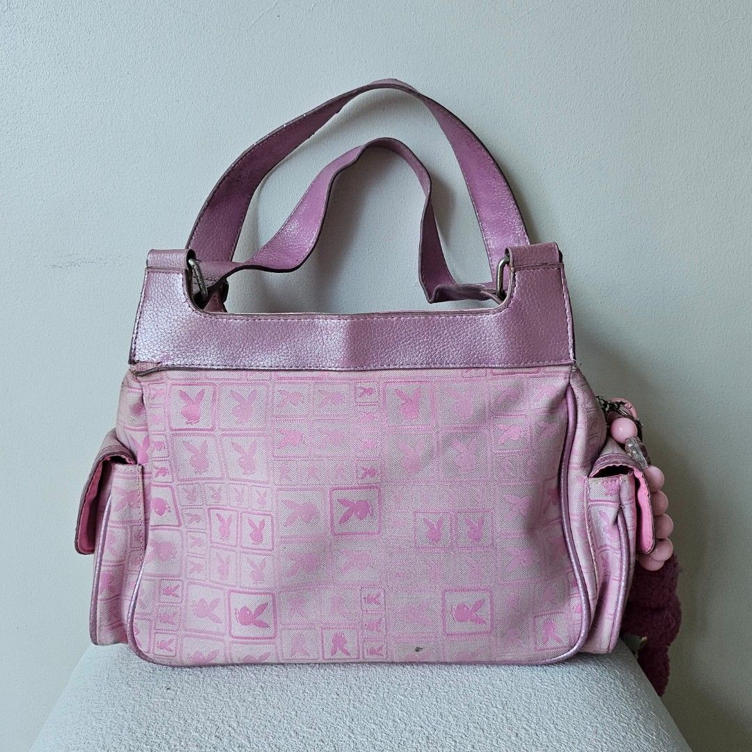 Vintage Y2k Playboy Multi-pocket Bag (Category: Shoulder Bags) located in Manila. Submitted by archievienne.vtg (Listing ID 1468103235, Image 2). Description: ☆ With signs of wear ☆ Metallic paint on leather rubbing off ☆ Needs cleaning ☆ Keychains on photo included ☆ Open for offers.