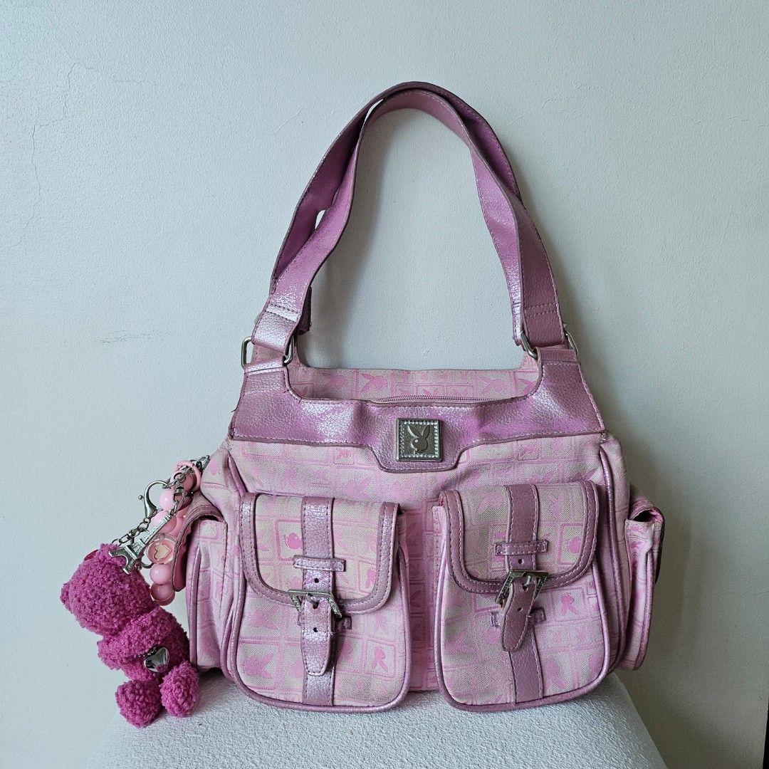 Vintage Y2k Playboy Multi-pocket Bag (Category: Shoulder Bags) located in Manila. Submitted by archievienne.vtg (Listing ID 1468103235, Image 1). Description: ☆ With signs of wear ☆ Metallic paint on leather rubbing off ☆ Needs cleaning ☆ Keychains on photo included ☆ Open for offers.