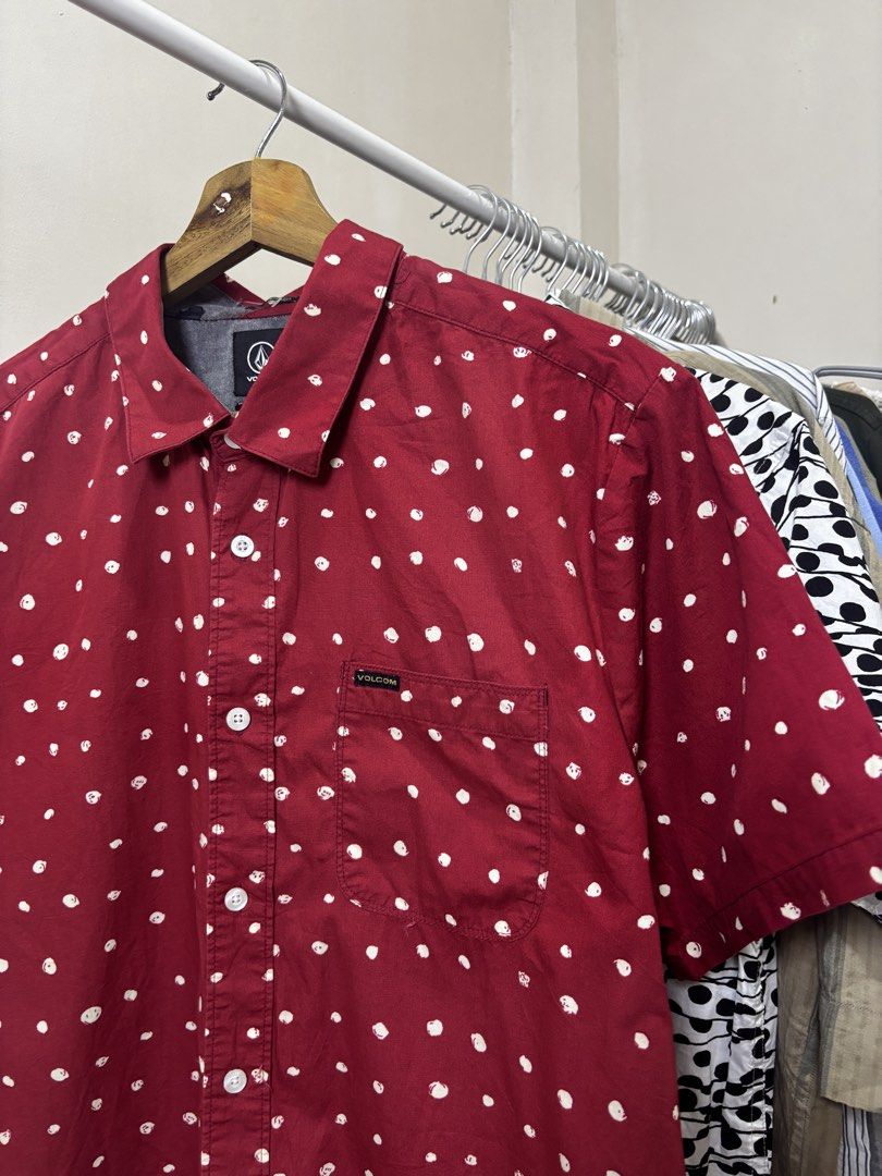 Volcom Red Polka Dot Short Sleeve Button-Down Shirt Size L (Category: Tshirts & Polo Shirts ) located in Ajuy. Submitted by galitsabarat (Listing ID 1468229586, Image 3). Description: EXCELLENT TO AS NEW CONDITION LARGE ON TAG DIMES 22.5x30 - Brand: Volcom - Style: Short sleeve button-down shirt - Color/Pattern: Rich red with all-over white polka dots - Fit: Modern fit - Size: Large (L) - Details: Standard collar, front button closure, single che