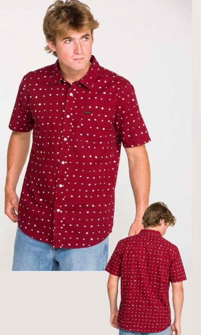 Volcom Red Polka Dot Short Sleeve Button-Down Shirt Size L (Category: Tshirts & Polo Shirts ) located in Ajuy. Submitted by galitsabarat (Listing ID 1468229586, Image 2). Description: EXCELLENT TO AS NEW CONDITION LARGE ON TAG DIMES 22.5x30 - Brand: Volcom - Style: Short sleeve button-down shirt - Color/Pattern: Rich red with all-over white polka dots - Fit: Modern fit - Size: Large (L) - Details: Standard collar, front button closure, single che