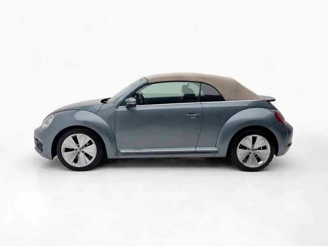 Volkswagen Beetle Cabriolet 1.2 TSI DSG (A) (Category: Used Cars) located in Singapore. Submitted by vincar_pre-owned (Listing ID 1468228316, Image 2). Description: Turn heads and feel the wind in your hair with this Beetle cabriolet, a timeless icon reimagined for modern fun. It blends classic charm with everyday performance. Perfect for city cruising or weekend escapes, the beetle cabriolet makes every drive a joyride. Contact us today to arran