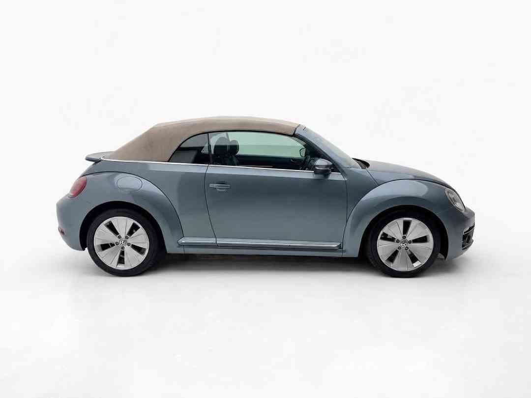 Volkswagen Beetle Cabriolet 1.2 TSI DSG (A) (Category: Used Cars) located in Singapore. Submitted by vincar_pre-owned (Listing ID 1468228316, Image 3). Description: Turn heads and feel the wind in your hair with this Beetle cabriolet, a timeless icon reimagined for modern fun. It blends classic charm with everyday performance. Perfect for city cruising or weekend escapes, the beetle cabriolet makes every drive a joyride. Contact us today to arran