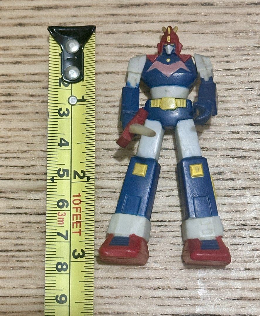 Voltes V Super Robot Wars Gashapon Mini Figure (Category: Vintage Collectibles) located in Mandaluyong City. Submitted by collectorsobsessions (Listing ID 1468111599, Image 1). Description: Voltes V Super Robot Wars Gashapon Mini Figure - Figure not Mint but still in Very Good condition. - With some dirt and staining due to age. - Sword is a bit curved. - Comes as is, what you see is what you get. - PRICE: P1,200.