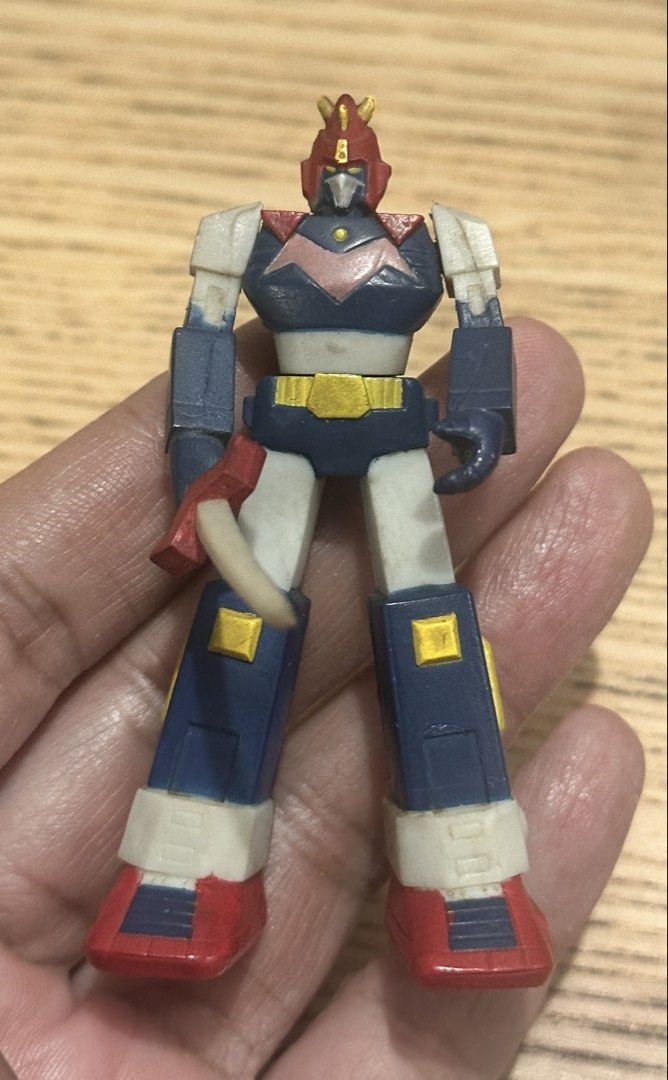 Voltes V Super Robot Wars Gashapon Mini Figure (Category: Vintage Collectibles) located in Mandaluyong City. Submitted by collectorsobsessions (Listing ID 1468111599, Image 2). Description: Voltes V Super Robot Wars Gashapon Mini Figure - Figure not Mint but still in Very Good condition. - With some dirt and staining due to age. - Sword is a bit curved. - Comes as is, what you see is what you get. - PRICE: P1,200.