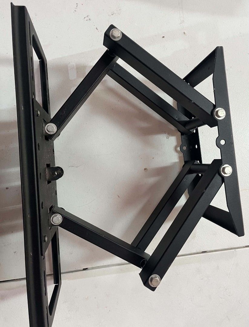 V-Star Adjustable Swivel TV Wall Mount Bracket (Category: TV Parts & Accessories) located in Manila. Submitted by tricia_00 (Listing ID 1468084102, Image 1). Description: - Heavy-duty V-Star articulating TV wall mount built from solid black powder-coated steel - Smooth dual arms extend and swivel for flexible viewing angles - Fully adjustable tilt settings to reduce glare - Fits most standard flat screen displays securely - Solid mounting plate w