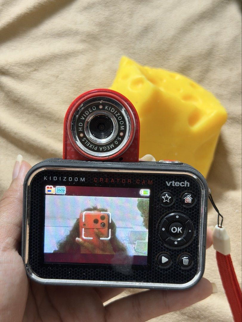 VTech KidiZoom Creator Cam HD Video Camera (Category: Cameras) located in Mandaluyong City. Submitted by josa_xox0i8 (Listing ID 1468247815, Image 1). Description: Selling a pre-owned VTech KidiZoom Creator Cam digital camera for kids! Condition: Functionality: 100% working! Takes photos, records videos with sound, and operates all built-in modes and features smoothly. Cosmetics: Shows normal signs of light use/scuffs on the outer casing. Note on