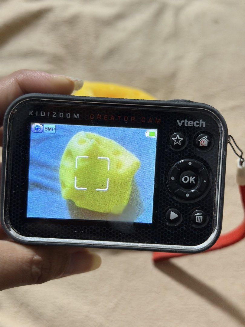 VTech KidiZoom Creator Cam HD Video Camera (Category: Cameras) located in Mandaluyong City. Submitted by josa_xox0i8 (Listing ID 1468247815, Image 2). Description: Selling a pre-owned VTech KidiZoom Creator Cam digital camera for kids! Condition: Functionality: 100% working! Takes photos, records videos with sound, and operates all built-in modes and features smoothly. Cosmetics: Shows normal signs of light use/scuffs on the outer casing. Note on