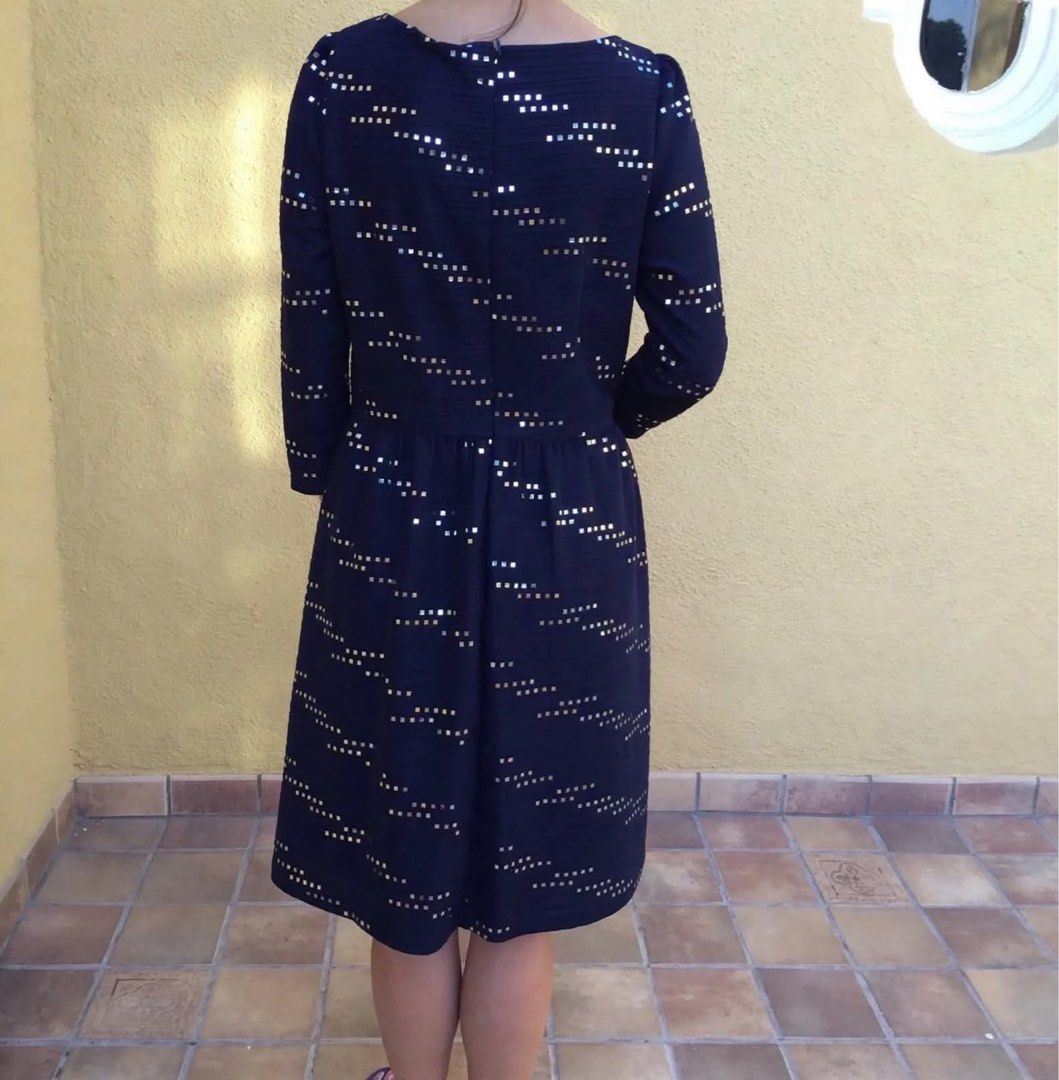 Wanko Navy Blue Sequin Textured Midi Dress (Category: Dresses) located in La Trinidad. Submitted by whatnotcollections (Listing ID 1468129348, Image 2). Description: - Brand: Wanko - Color: Navy blue with subtle silver sequin accents - Style: Midi dress with long sleeves, boat neckline, and gathered waist - Material: Textured fabric - Approximately 19 inches width, 16 inches waist and 36 inches length. (laid flat) Slightly negotiable for sure buy