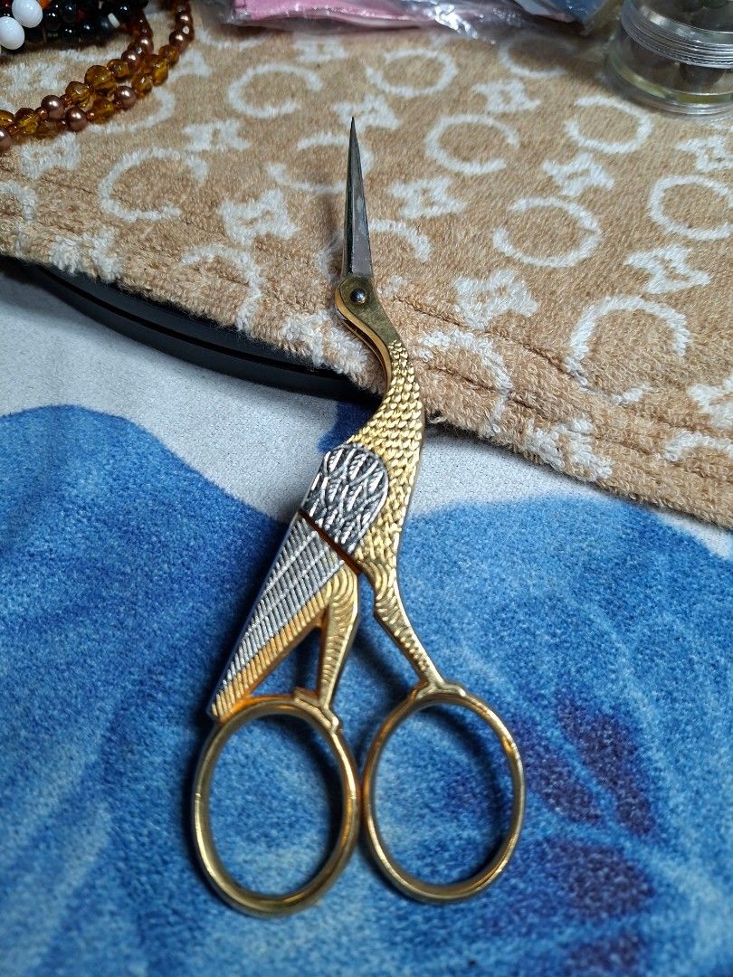 Wasa Solingen Germany Stork Embroidery Scissors (Category: Craft Supplies & Tools) located in Lucena. Submitted by dai_suki (Listing ID 1468198422, Image 1). Description: - Authentic Wasa Solingen Germany stork embroidery scissors - Stunning gold and silver tone finish with intricate scale and textured wing details - Sharp fine tip for precision crafting, sewing, and thread trimming - Rare collector's piece featuring the original maker stamp on t
