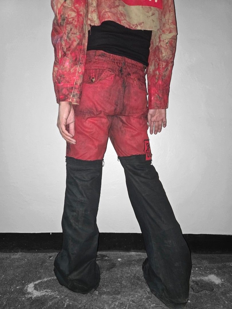 WEARy Studios painted flared pants (Category: Jeans) located in Caloocan City. Submitted by wearystudios (Listing ID 1468219326, Image 2). Description: "BICHROME" flared pants cut trousers with extended denim cut-outs attached upside-down to get the perfect natural flare, handpainted all over with red and black textile paints 1/1 Waist 31-32 Crotch 14.5 Thigh 11.5 Full length 47.5-48 Leg opening 14 10,500.
