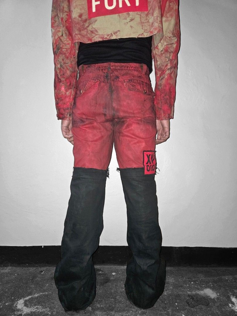 WEARy Studios painted flared pants (Category: Jeans) located in Caloocan City. Submitted by wearystudios (Listing ID 1468219326, Image 3). Description: "BICHROME" flared pants cut trousers with extended denim cut-outs attached upside-down to get the perfect natural flare, handpainted all over with red and black textile paints 1/1 Waist 31-32 Crotch 14.5 Thigh 11.5 Full length 47.5-48 Leg opening 14 10,500.