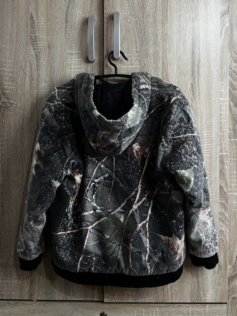WFS Element Gear Camo Hooded Jacket XL (Category: Coats, Jackets and Outerwear) located in Manila. Submitted by dyamir. (Listing ID 1468091518, Image 2). Description: - Brand: WFS Element Gear - Size: XL youth size -dimes: 21x23 - Design: Real tree leaf camo pattern - Features: Full zip front, button flap chest pockets, side pockets, attached hood - Comfort: Warm quilted black lining with black ribbed cuffs and hem - Style: Great winter outerwear