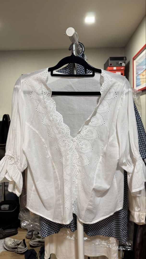 White Embroidered Lace top (Category: Blouses) located in Mandaluyong City. Submitted by forlaughandlemons (Listing ID 1468247259, Image 1). Description: With seamless/invisible-looking buttons Ruched sleeves - small to medium.