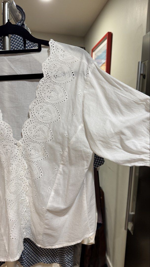 White Embroidered Lace top (Category: Blouses) located in Mandaluyong City. Submitted by forlaughandlemons (Listing ID 1468247259, Image 3). Description: With seamless/invisible-looking buttons Ruched sleeves - small to medium.