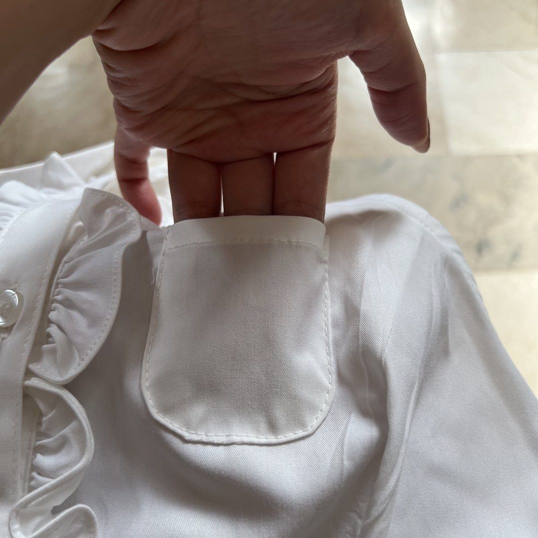 White halter neck top (S) (Category: Blouses) located in Cebu City. Submitted by sammaemendoza (Listing ID 1468174257, Image 3). Description: Brand: She by shi (Vietnam brand) XL on tag but it runs small. Best fits small .