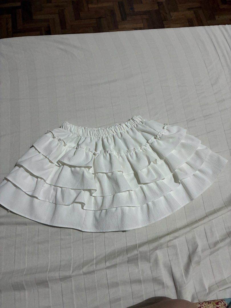White Multi-Tiered Ruffle Skirt with Drawstring Waist (Category: Skirts) located in Paranaque City. Submitted by intheaftrglw (Listing ID 1468199093, Image 2). Description: ruffled mini skirt; stretchable.